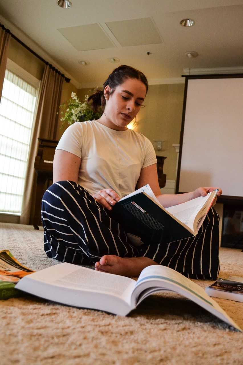 student reading book 