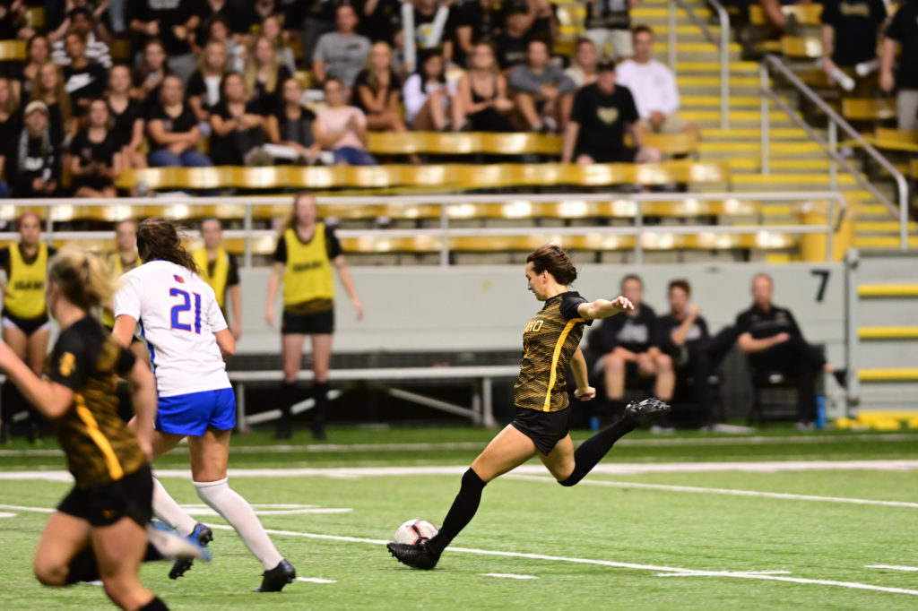 Kaysie Bruce goes in for a kick during the Broncos game.